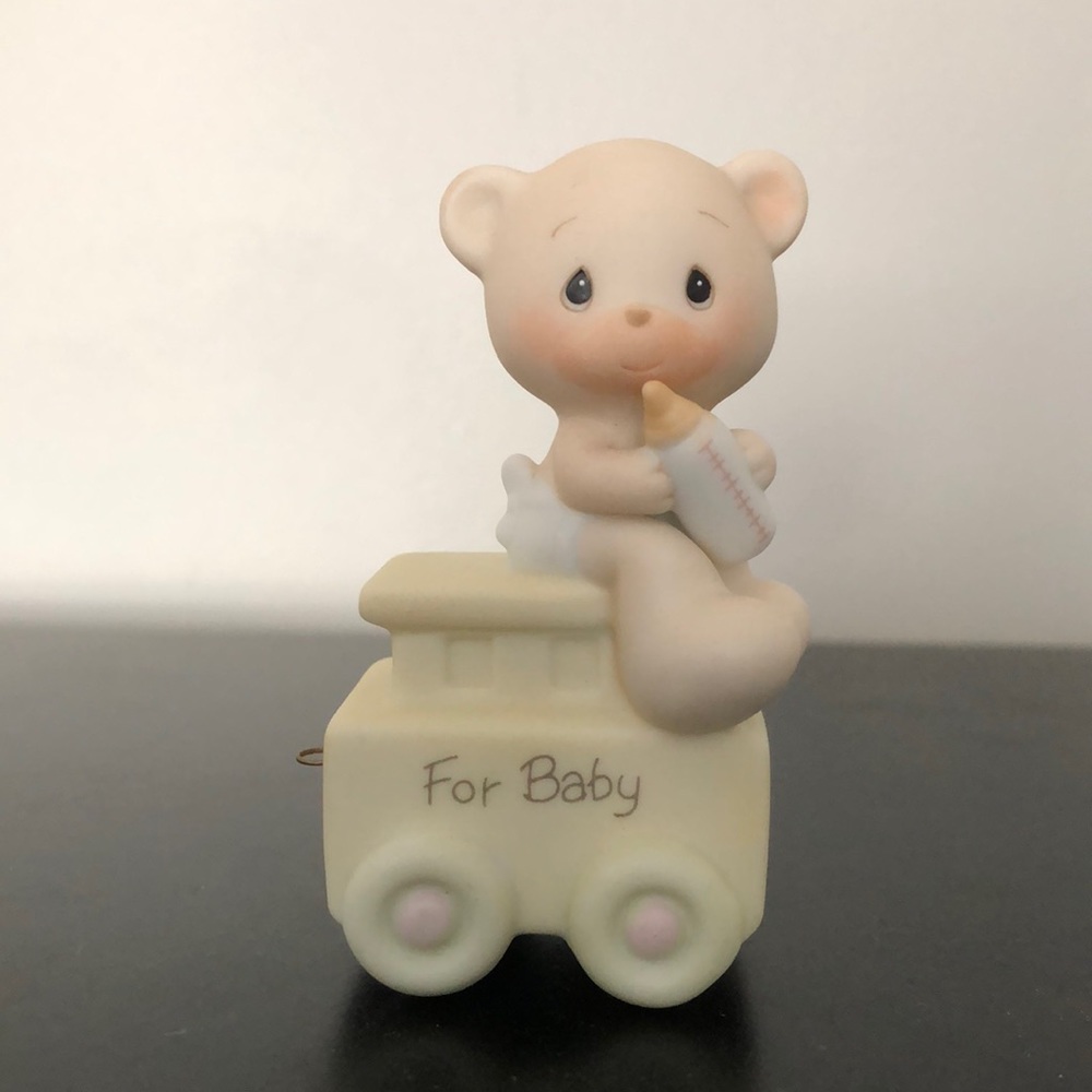 Precious Moments baby figurine